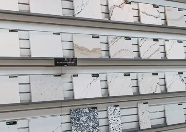 Lake Quartz Gallery offers a full wall of small sample slabs so customers can see the full breadth of Cambria quartz options.